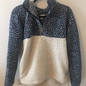 Soft blue and white pullover